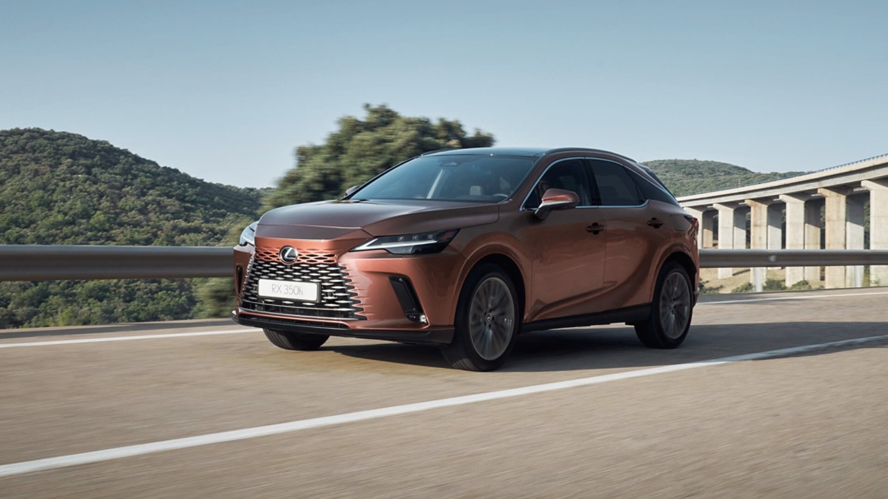 Lexus RX 350h driving in a mountainous location 